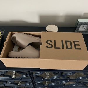 Brand new Yeezy Slide “pure” size 8. Unfortunately my lady wasn’t a fan.